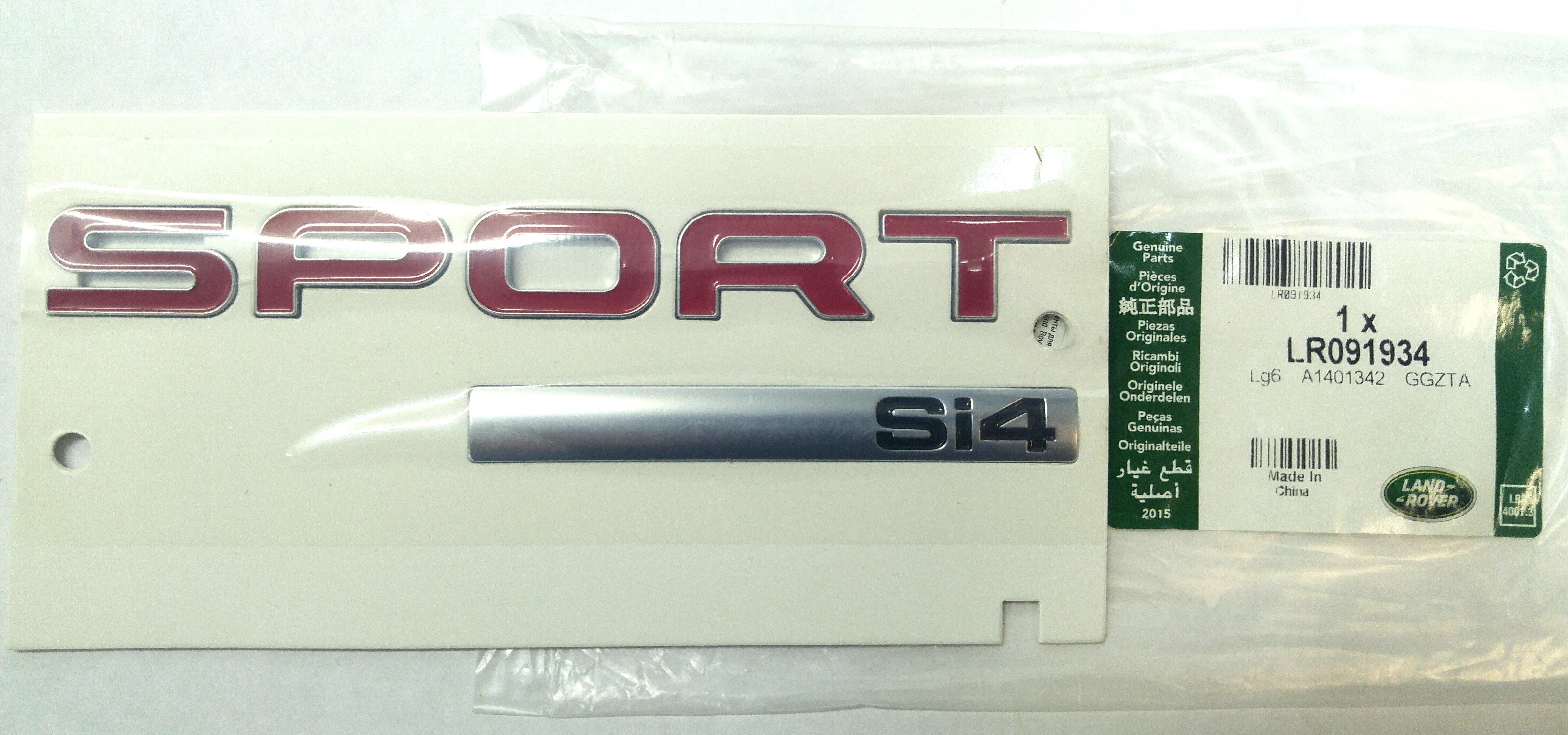 Эмблема крышки багажника "SPORT SI 4" (красная) (LR096574||LAND ROVER)